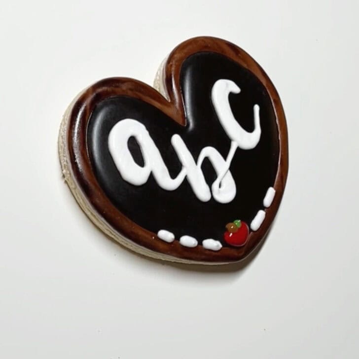 how to decorate chalkboard cookies decorated with royal icing
