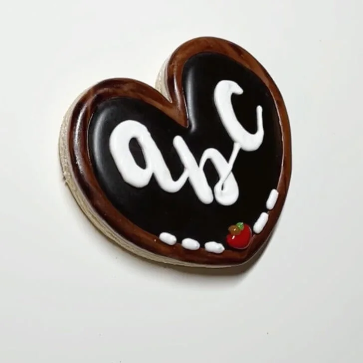 how to decorate chalkboard cookies decorated with royal icing