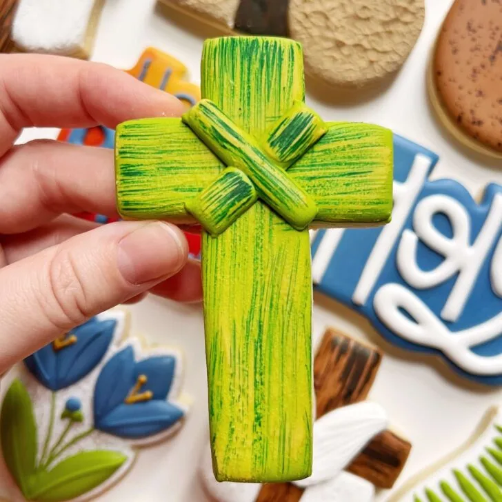 palm cross cookies decorated with royal icing
