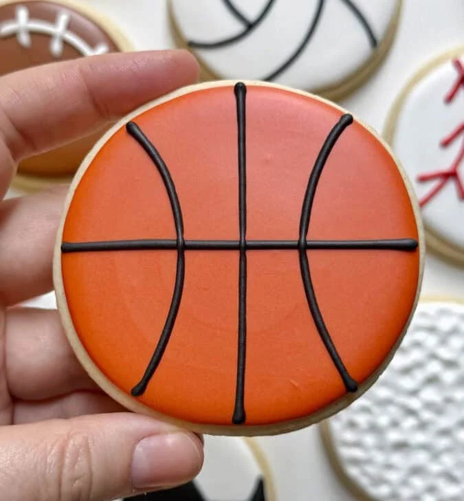 basketball cookie decorated with royal icing