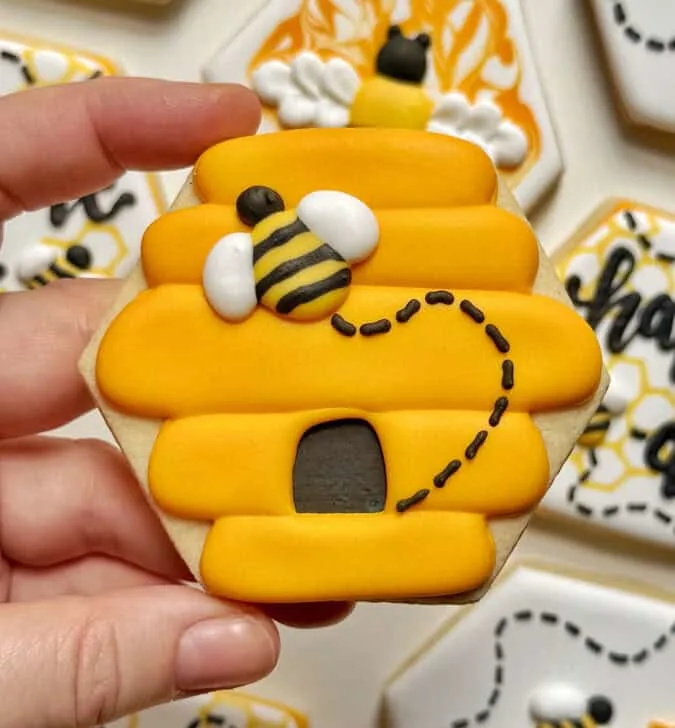 beehive cookies decorated with royal icing