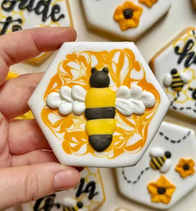 bee cookies decorated with royal icing