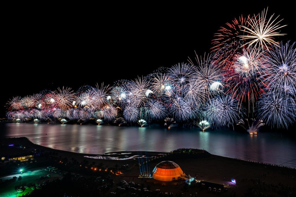 UAEThrive Daily News Roundup showcasing the vibrant culture and celebrations in the UAE, with fireworks lighting up the Ras Al-Khaimah waterfront.