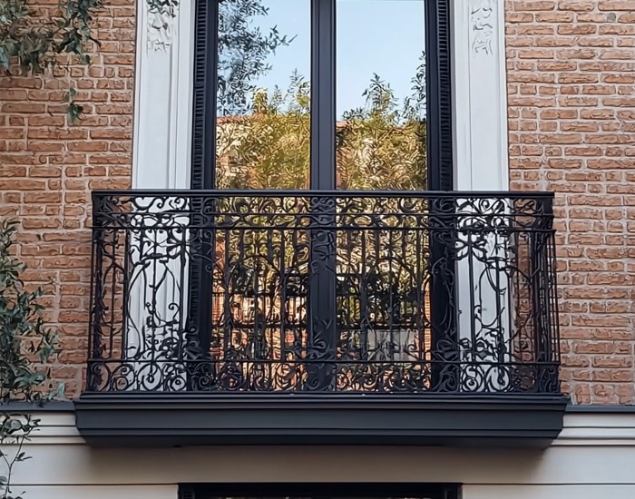 black metal french balcony with glass doors