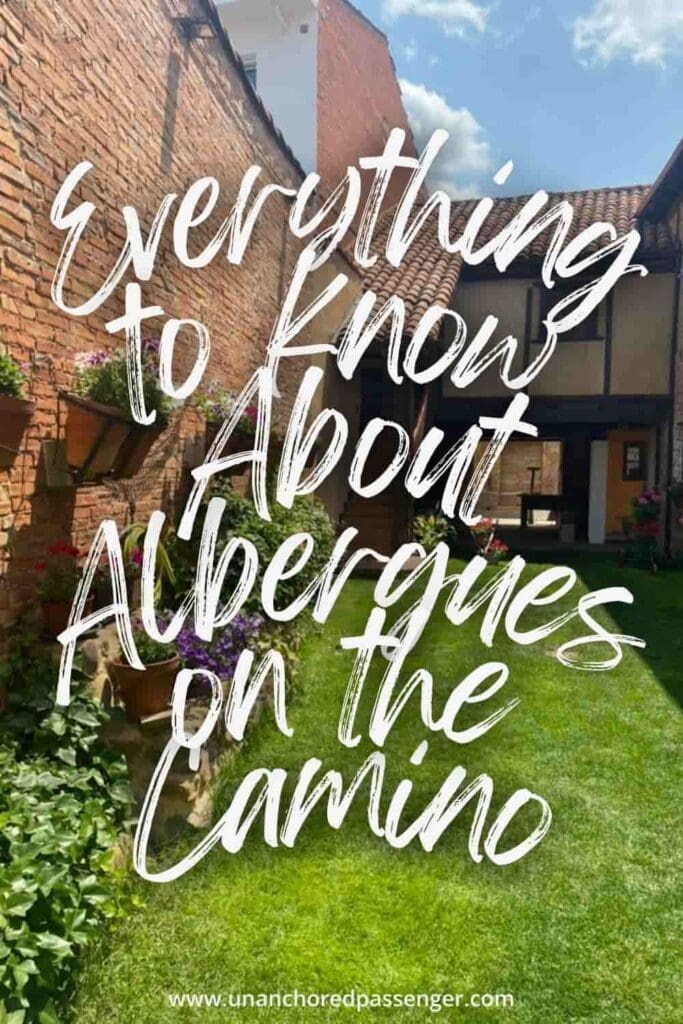 Outdoor courtyard in an albergue on the Camino Francés with text that says "Everything to Know About Albergues on the Camino"