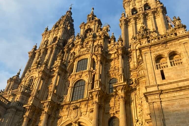 The cathedral in Santiago de Compostela illuminated in golden light by the setting sun