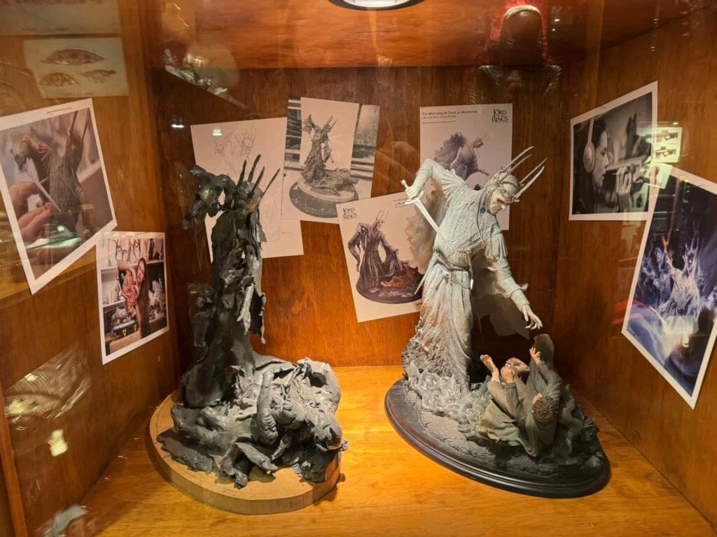 Two miniature sculptures at the Wētā Cave mini-museum in Wellington showing the Witch King from LOTR about to stab Frodo in the real world and in the altered reality Frodo experiences when he wears the ring.