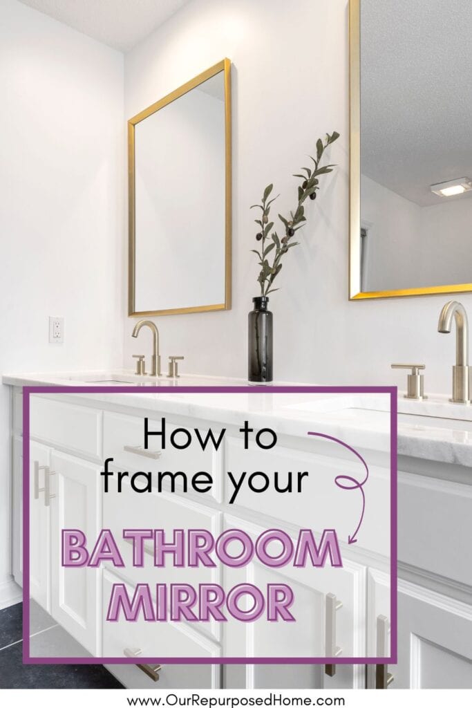 bathroom with gold framed mirrors