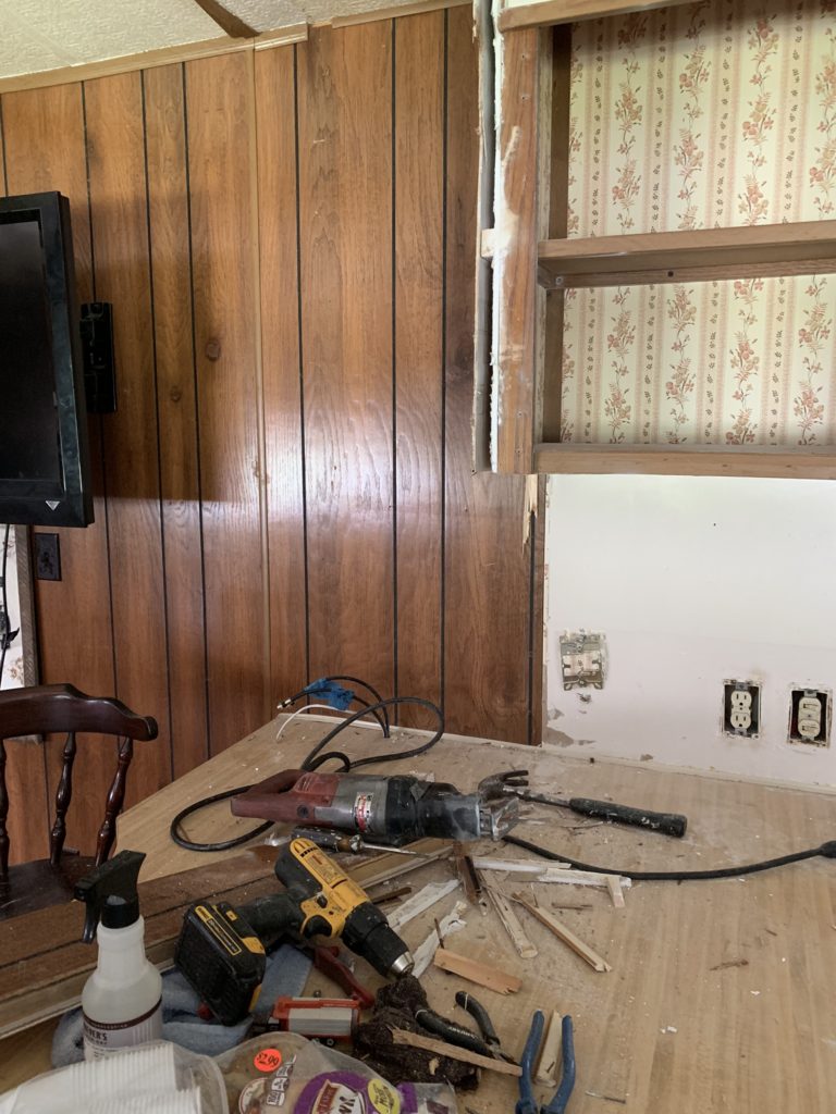tearing out the corner cabinet in mobile home