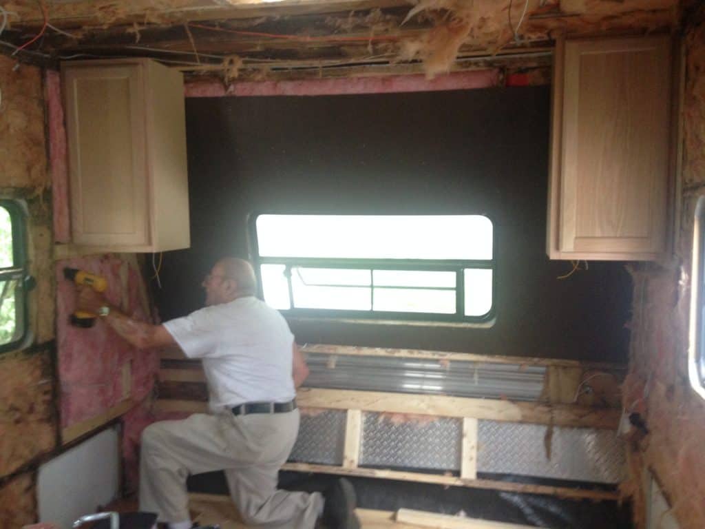 picture of our RV bedroom torn apart.  Camper remodel before and after