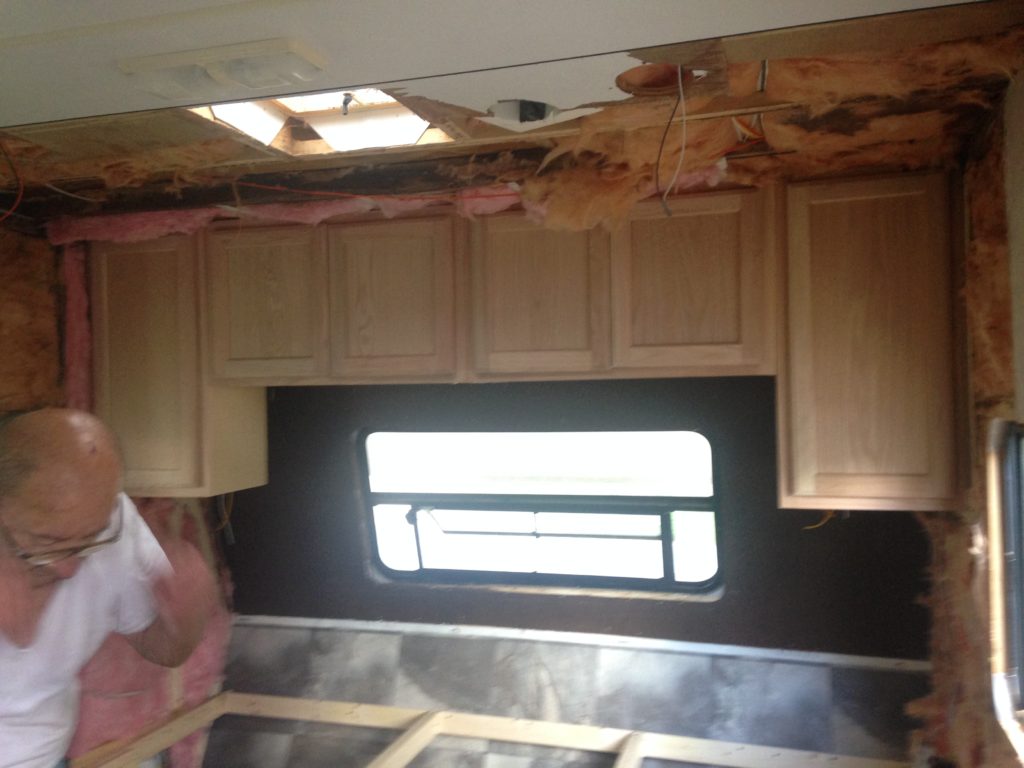 installing the cabinets in our camper remodel before and after