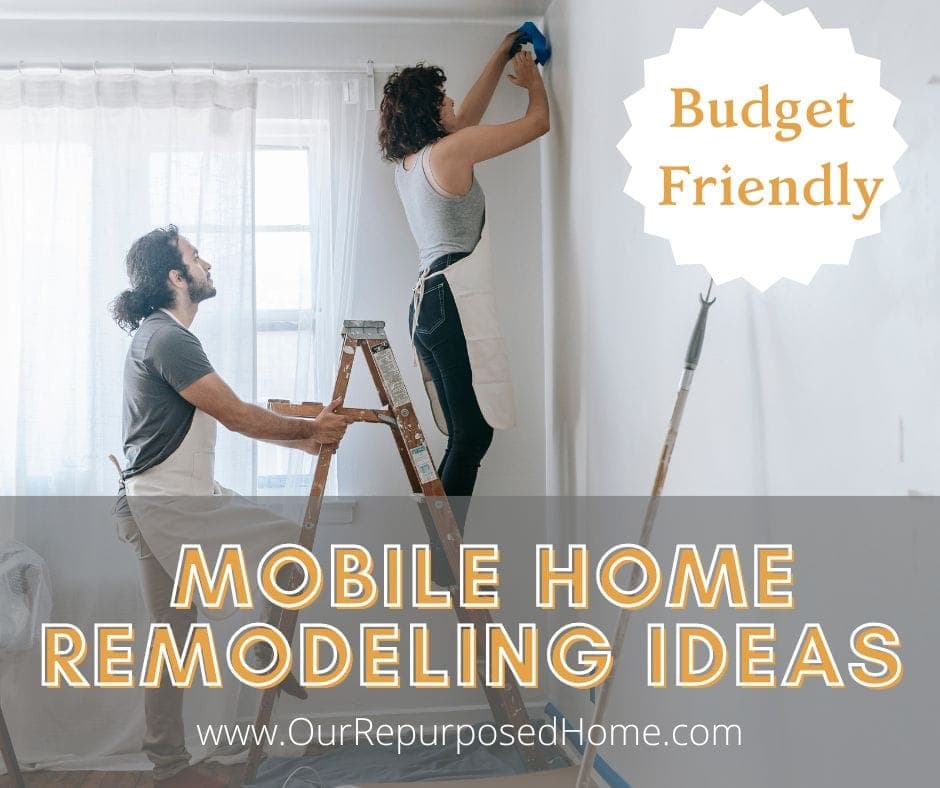 couple painting a wall in a mobile home