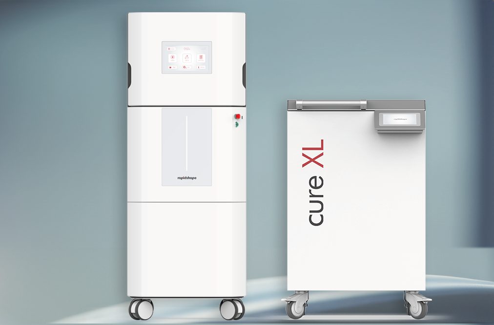 D50+ 3D printer with triple print range, automated part separation, and resin refill system for high-volume, continuous printing without manual intervention. RS cure XL curing machine with extra-large volume, ideal for efficient post-curing of large or numerous 3D-printed components, featuring 360° illumination and vacuum technology to reduce operating costs.