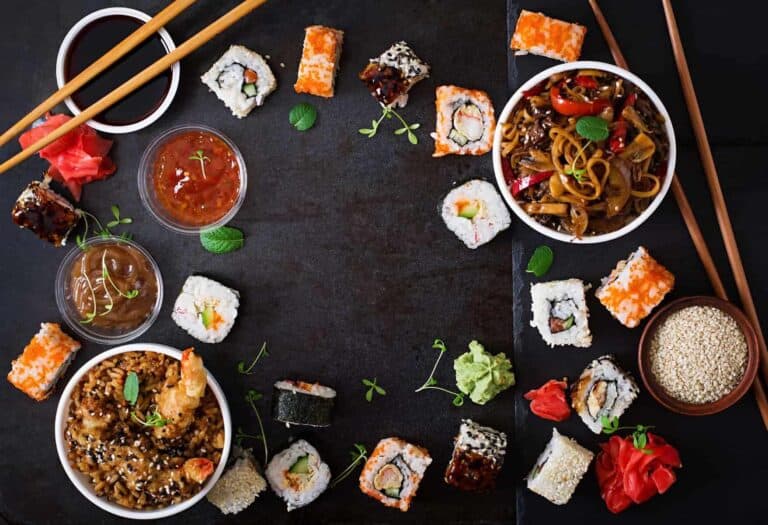 Traditional-Japanese-food-sushi-rolls-rice-with-shrimp-and-udon-noodles-with-chicken-and-mushrooms
