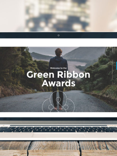 Laptop with branded web design by brand specialists Wonderlab.