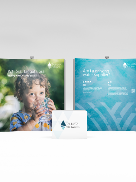 A pop up display with a picture of a child and a box.