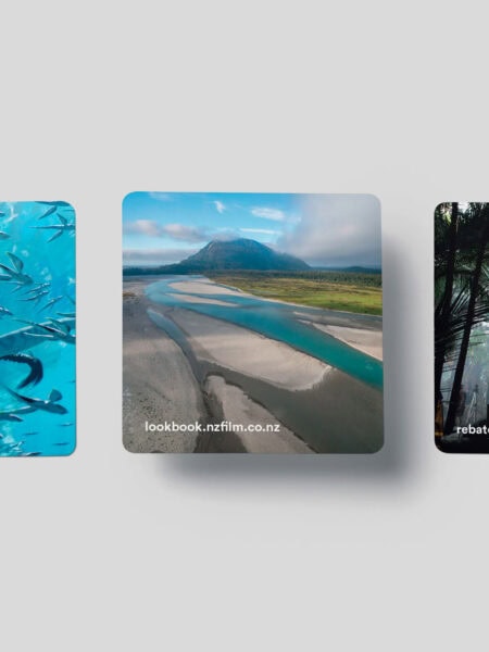 Three square images with text links: a person swimming with fish underwater ("podirectory.nztfiln.co.nz"), a scenic river landscape beneath a blue sky ("lookbook.nztfiln.co.nz"), and sunlight filtering through a dense forest ("rebates.nztfiln.co.nz").
