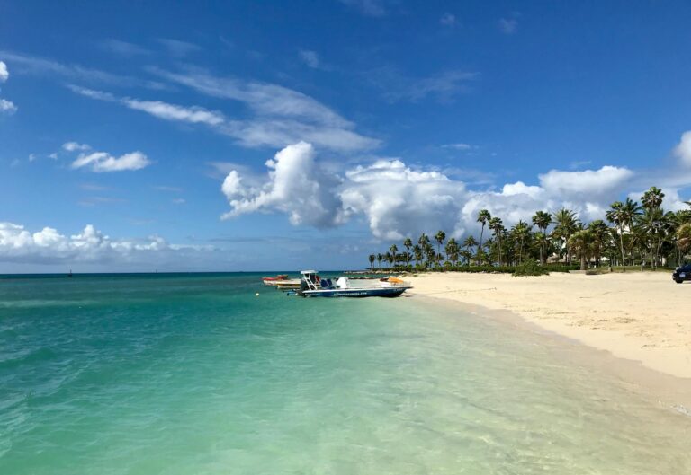 a boat docked near the seashore