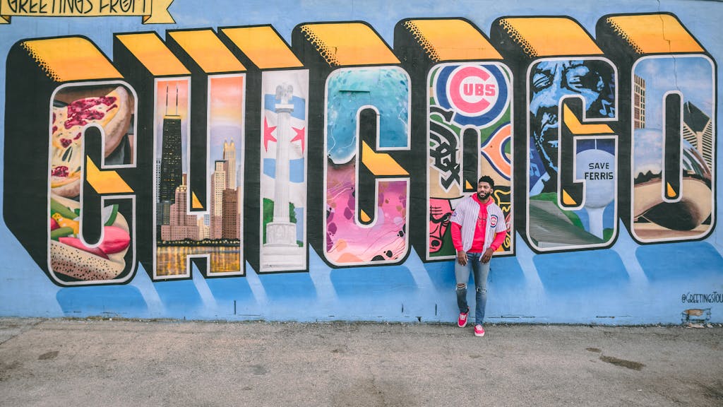 Man Posing By Street Art