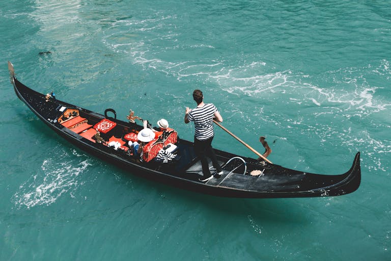 Man Standing on Gondola