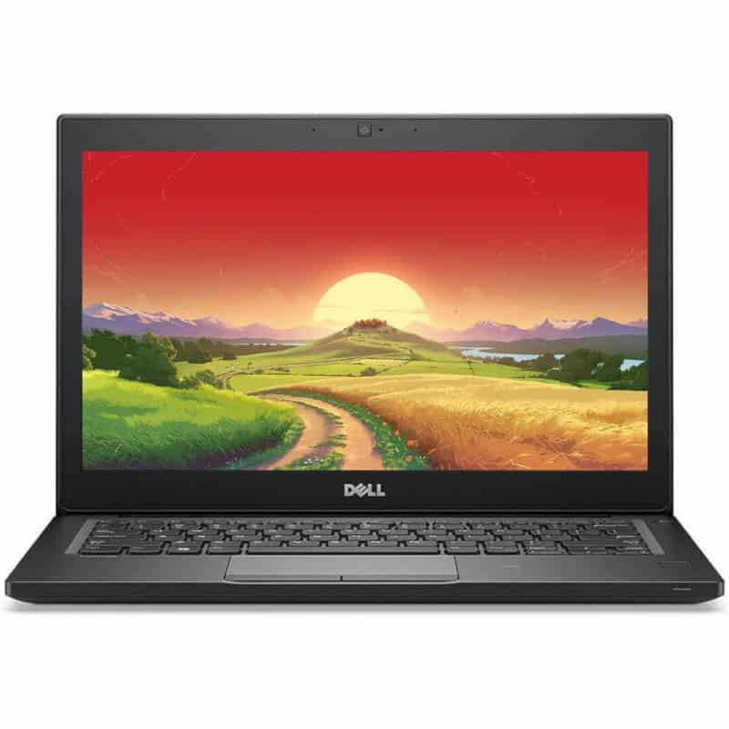 Ordinateur portable Dell affichant un paysage coloré avec un coucher de soleil, idéal pour illustrer la technologie et la créativité.