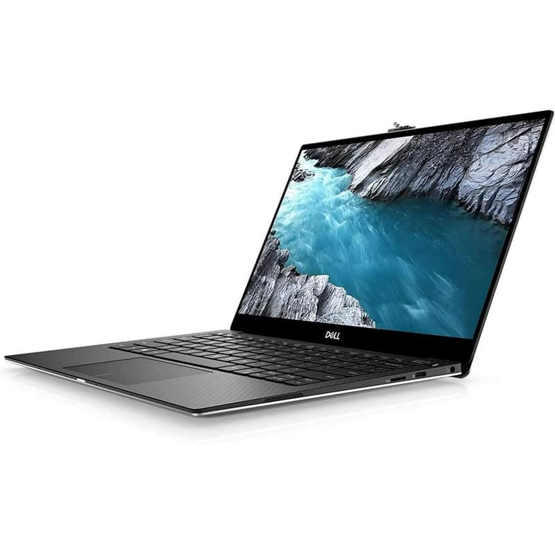 Ordinateur portable Dell avec écran affichant un paysage de montagne et de rivière, idéal pour le travail et la productivité.