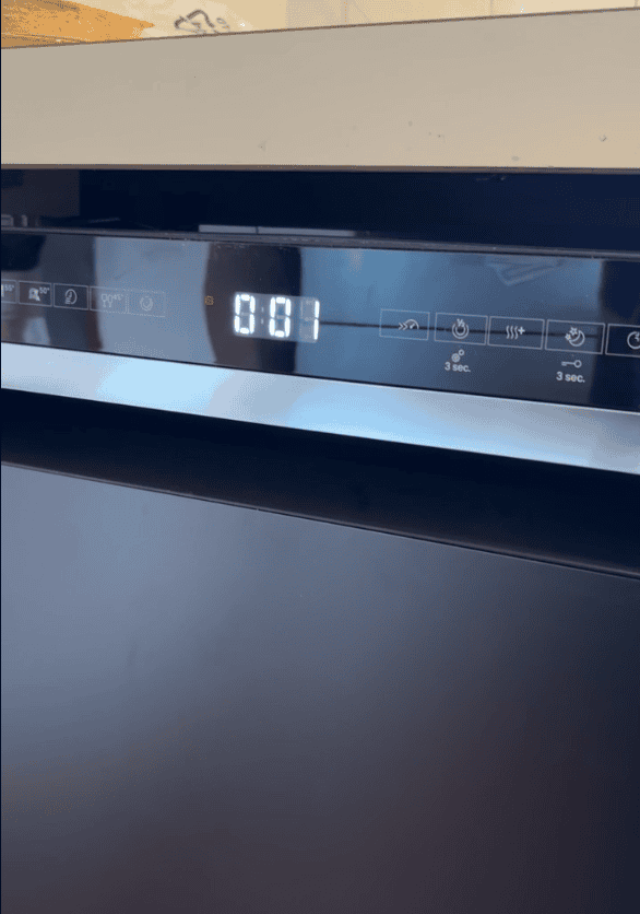 Dishwasher being tested after installation in Griffith