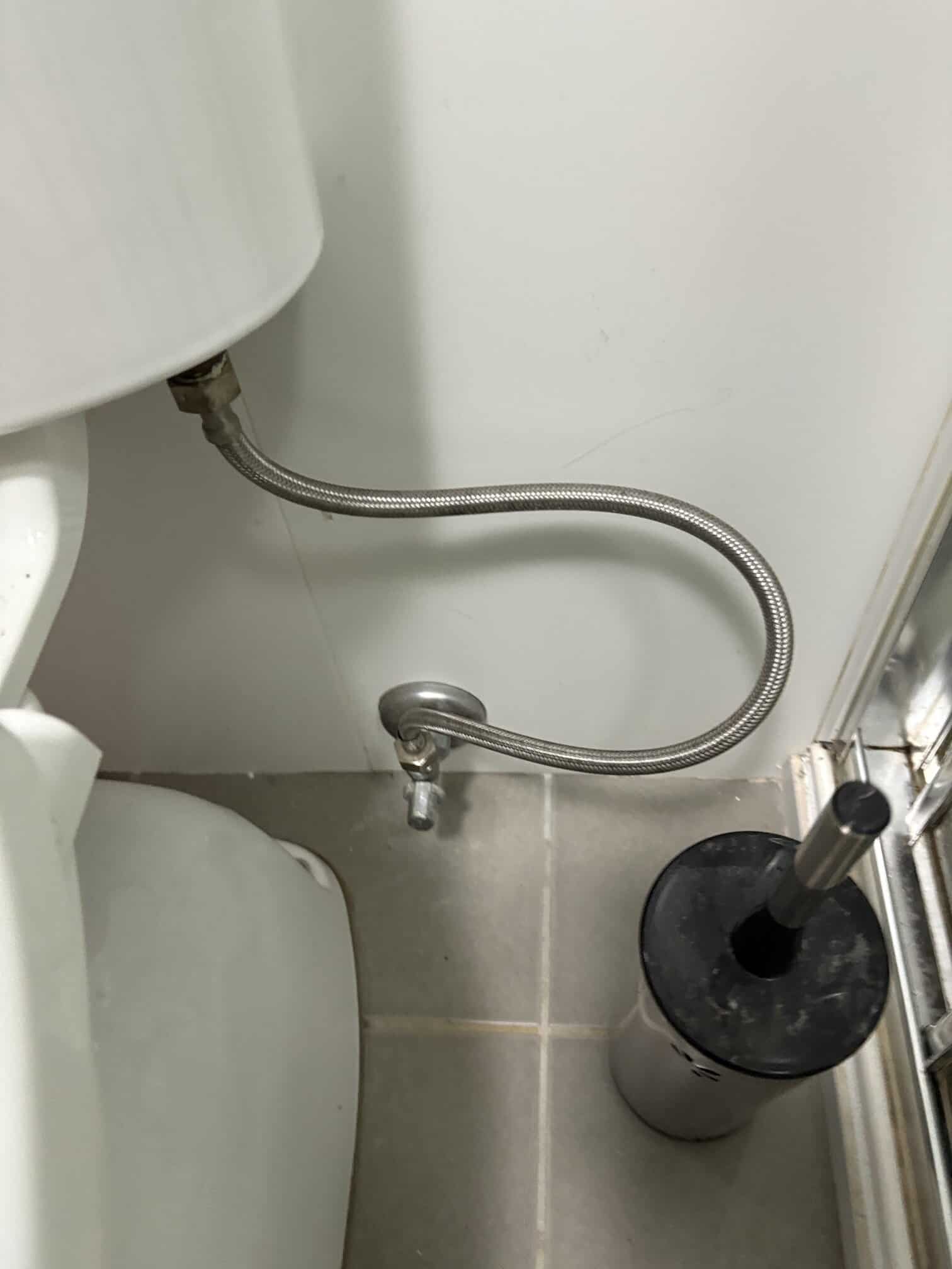 Water Tight Canberra plumber replacing Caroma outlet valve in Dickson bathroom.
