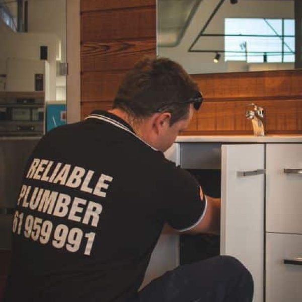 man repairing man repairing