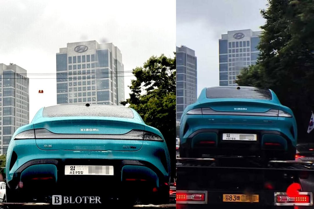 Vista posteriore della Xiaomi SU7 Max di colore turchese sotto la pioggia in una città asiatica.