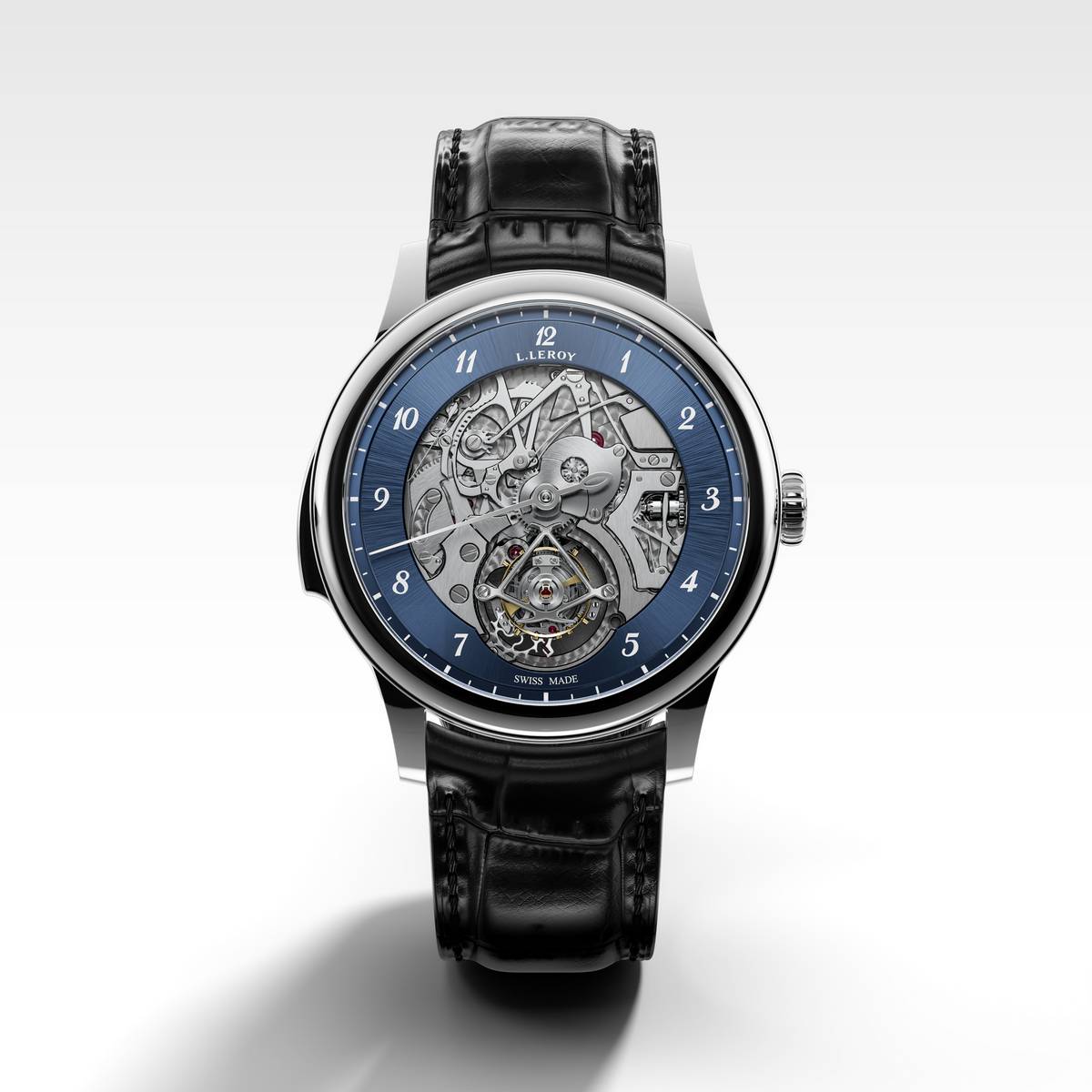 Originale orologio tourbillon con cassa in acciaio e quadrante scheletrato con fondello visibile. Design elegante con cinturino in pelle nera e dettagli di precisione svizzera.