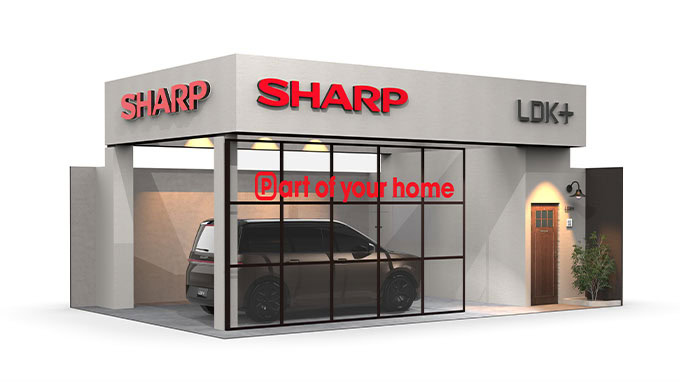 Automobile in showroom Sharp LDK+ con vetri ampi e design moderno.