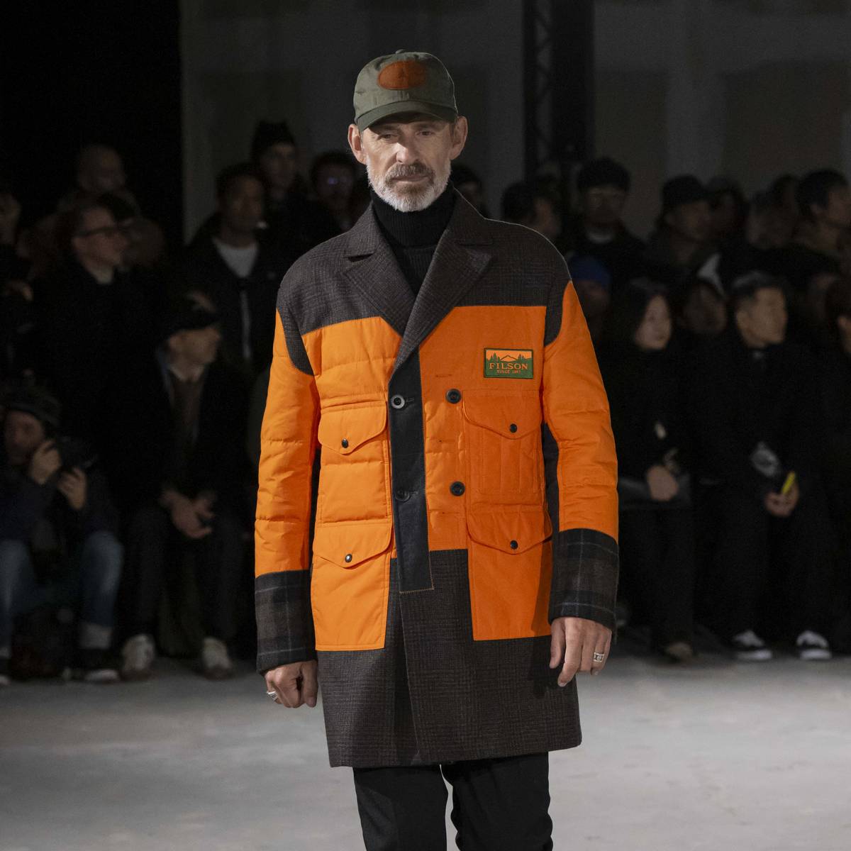 La capsule di capispalla utilitari che fondono il linguaggio di design all’avanguardia di Watanabe, con l’artigianalità leggendaria di Filson