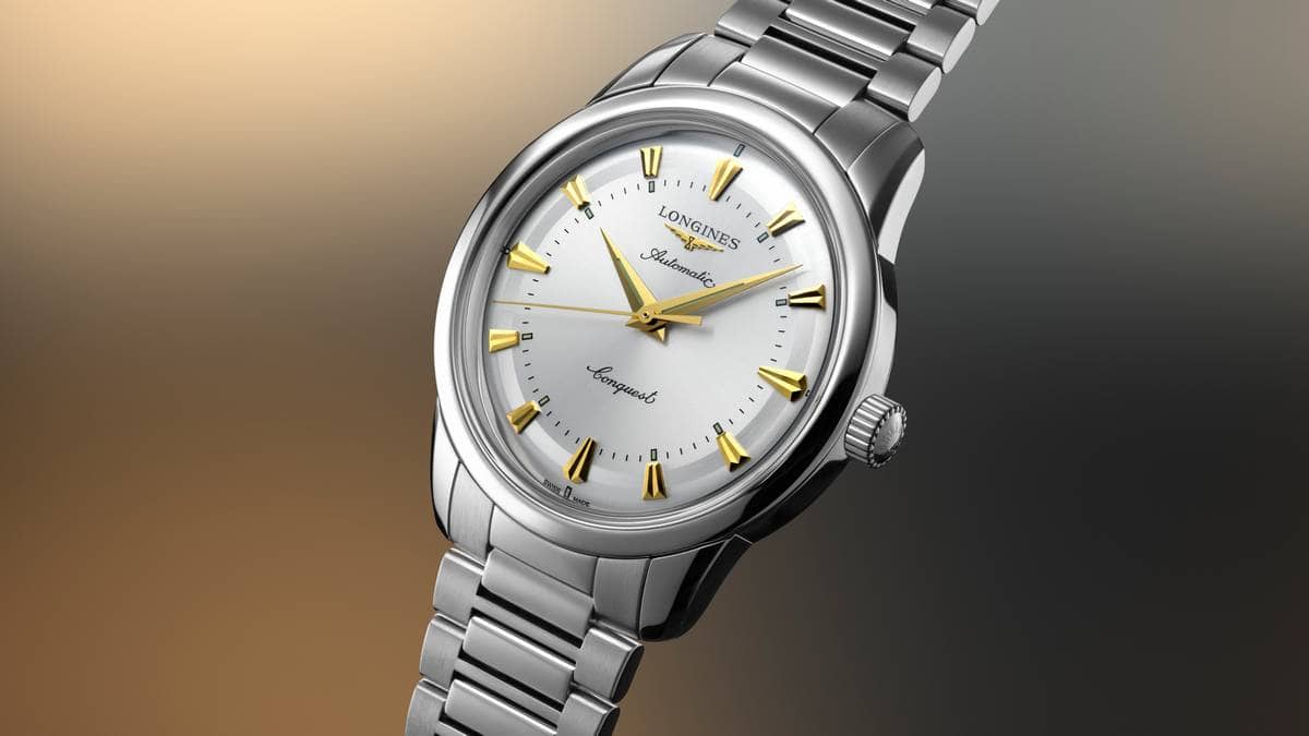 Quadrante argentato con indici oro, cassa e bracciale in acciaio, automatico elegante per Longines Conquest Heritage 2025